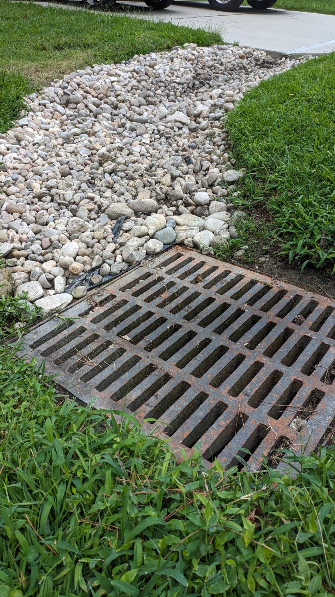 Removing Large Rocks Barrier Proper Drainage